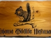 602  Wood carving forest trail sign with carved squirrel