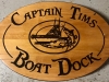 607  carved wood boat dock address sign with boat carving